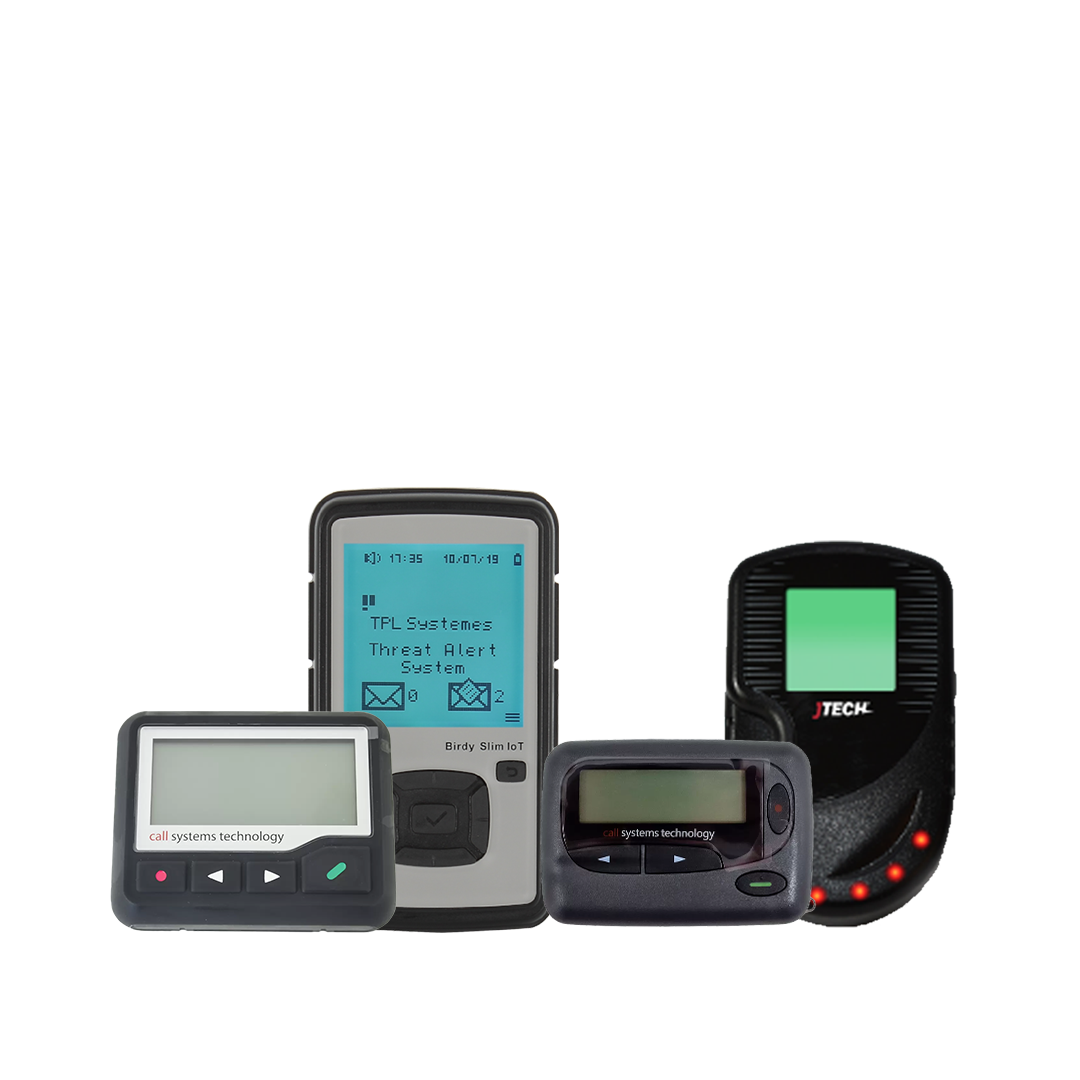 Collection of four paging devices next to each other